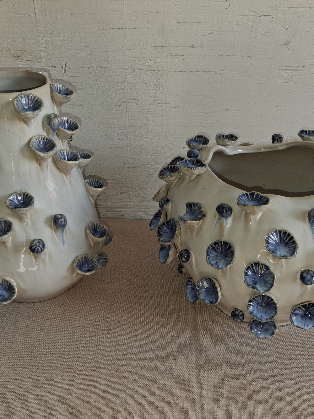 Handcrafted White Ceramic Vase with Blue Floral Accents